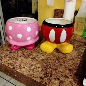 A set of Minnie mouse and Mickey mouse planters